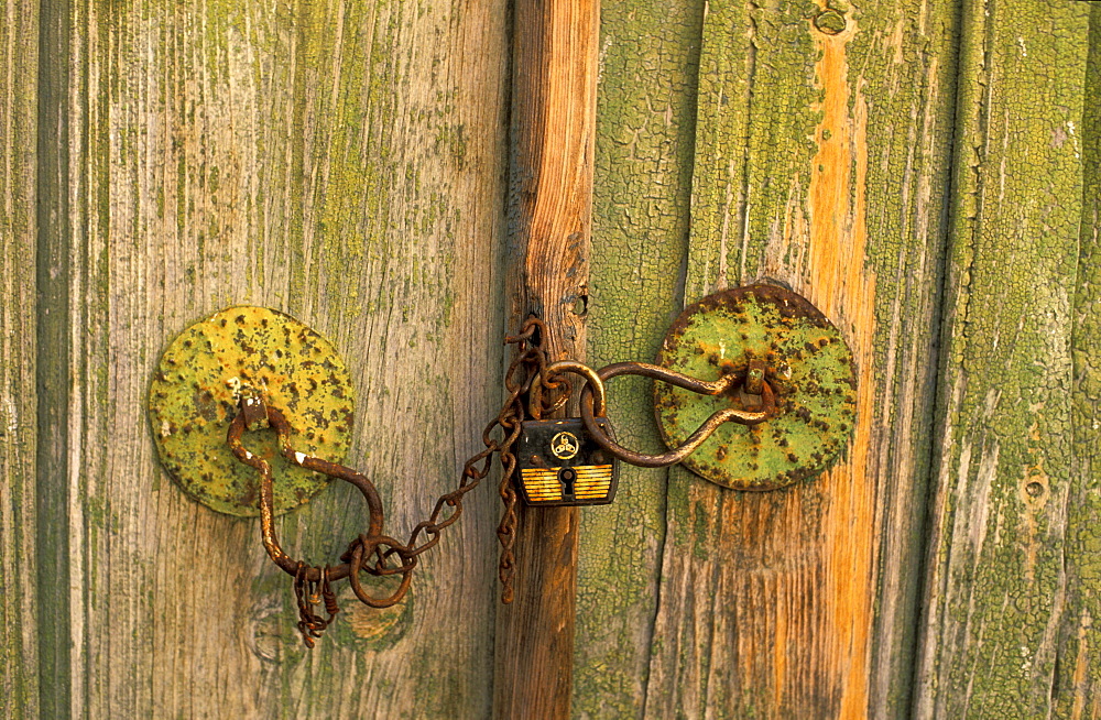 Padlock on a wooden door at the mountain village Galata, Cyprus