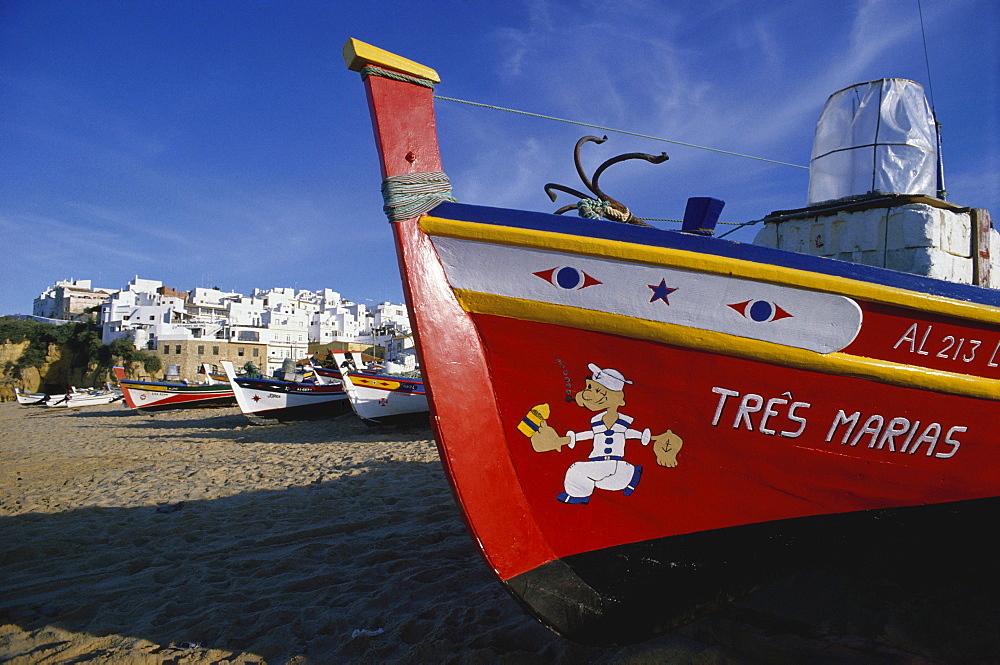 Boats lying on the beach of a village, Algarve, Portugal