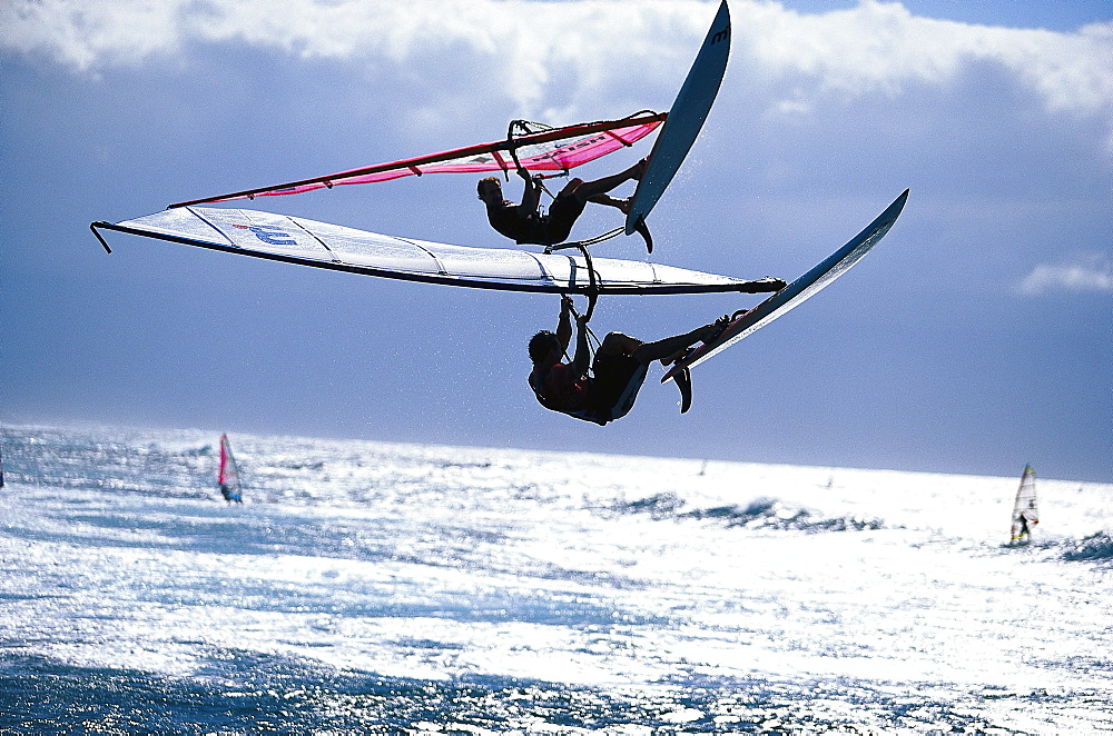 Sailboarders during a jump, Hookipa, Maui, Hawaii, USA, America