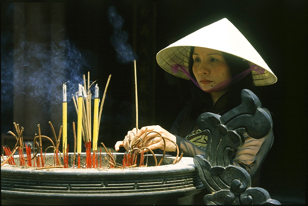 Worship in Dai Hung temple, Hue, Vietnam, Asia