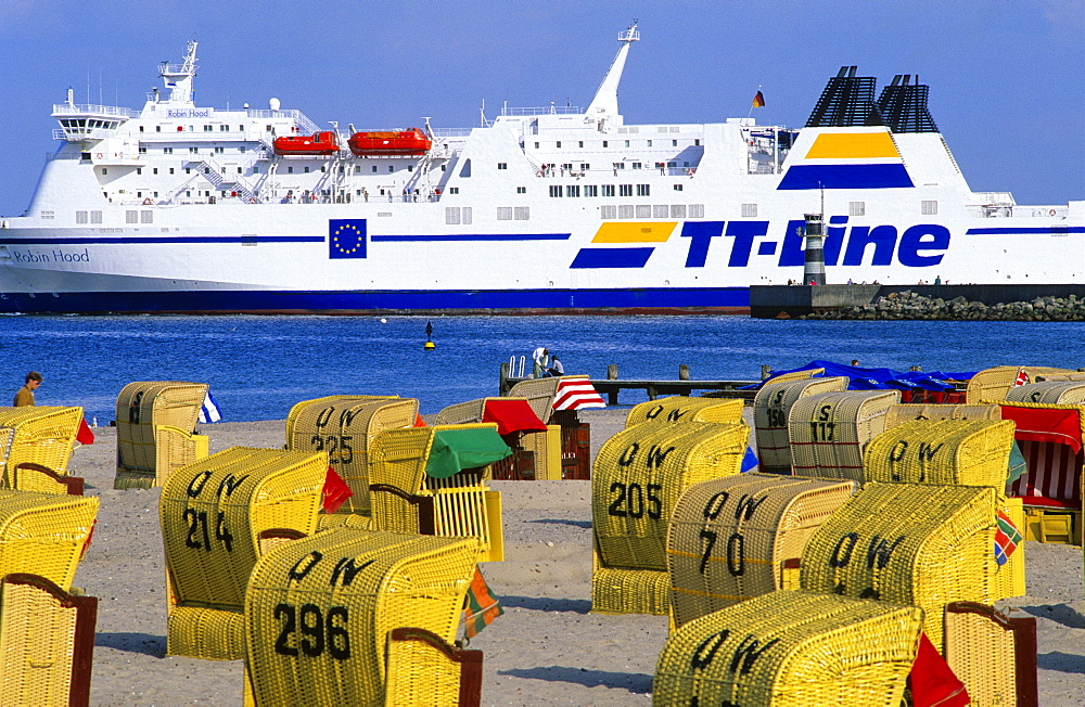 View over beach chairs on the beach at a ferry, Travemuende, Schleswig Holstein, Germany, Europe