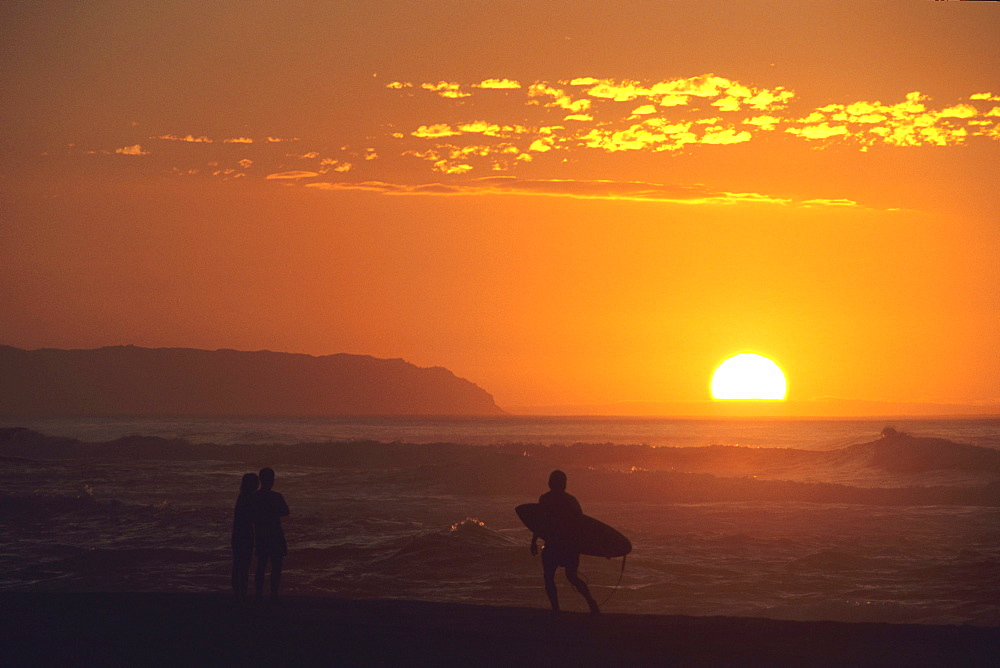 Couple & Surfer at Sunset, Barking Sands Beach, Polihale State Park, Kauai, Hawaii, USA