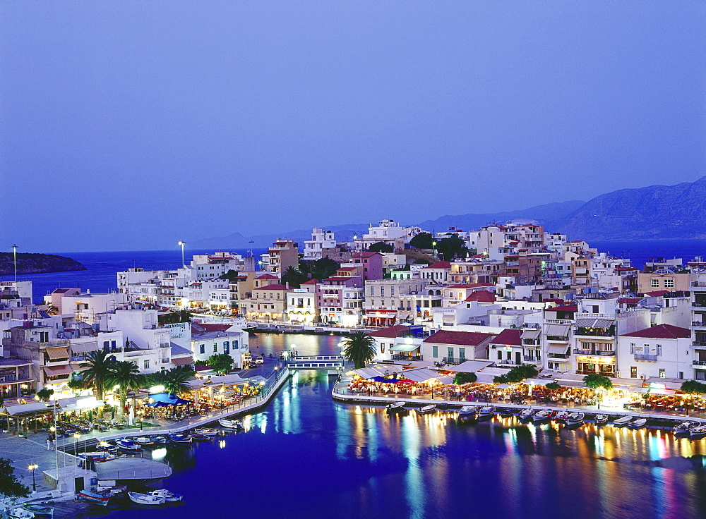 Agios Nikolaos at Voulismeni Lake in the evening, Crete, Greece