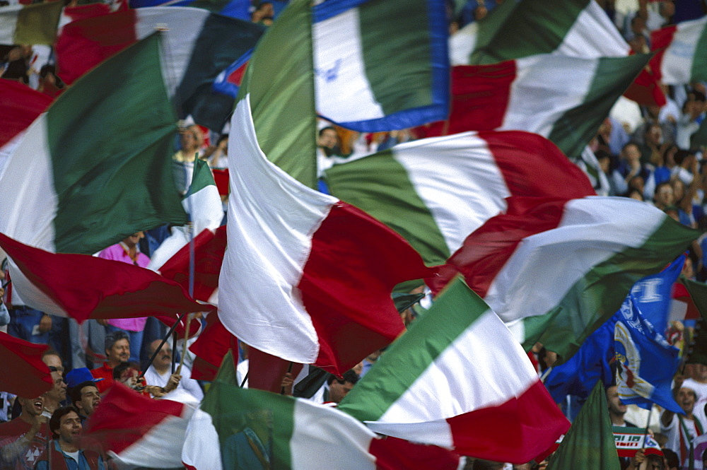 Italian soccer fans swaying flags