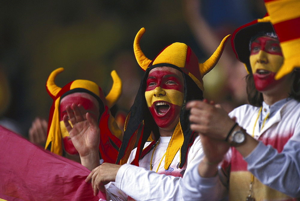 Spanish football fans wearing a helmet