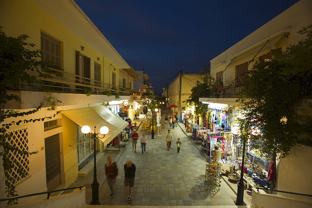 People strolling over shopping street with souvenir shops in the evening, old town, Kos-Town, Kos, Greece