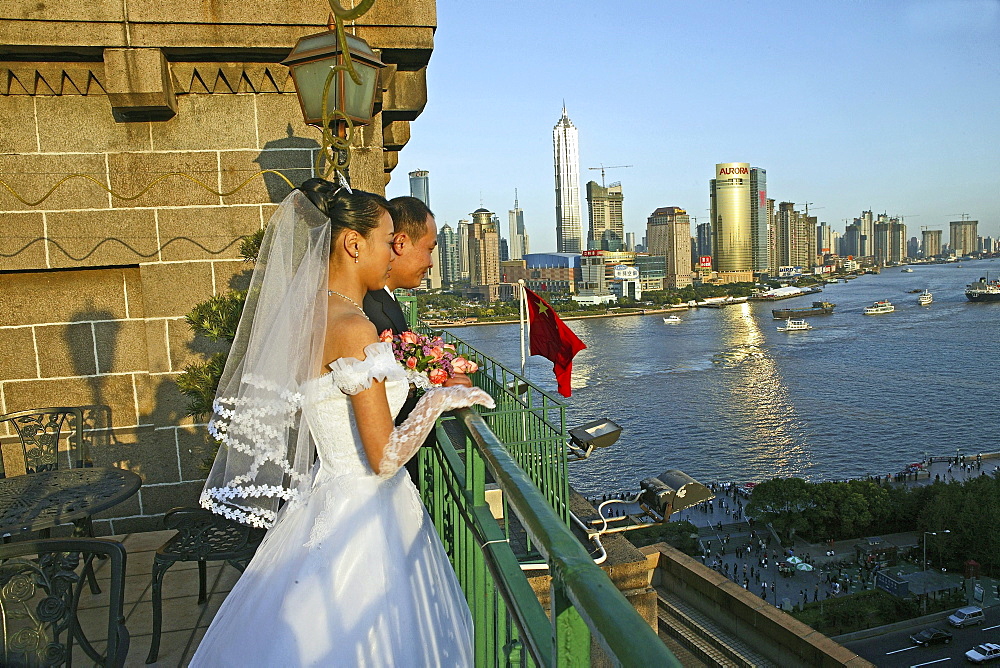 Bride and groom, Peace Hotel, White wedding, view above Pudong and river