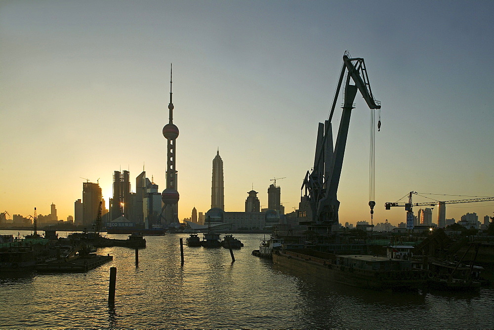 Harbour, View from Waibaidu Bridge, Huangpu-River, Pudong, line of freight barges, man with helmet