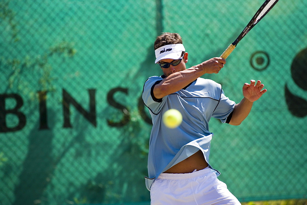 Man playing tennis, Apulia, Italy