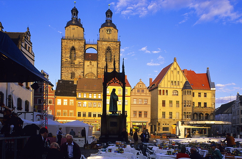 Europe, Germany, Saxony Anhalt, the memorial of Martin Luther on the market square in front of the town hall and Saint Mary's Church in Wittenberg