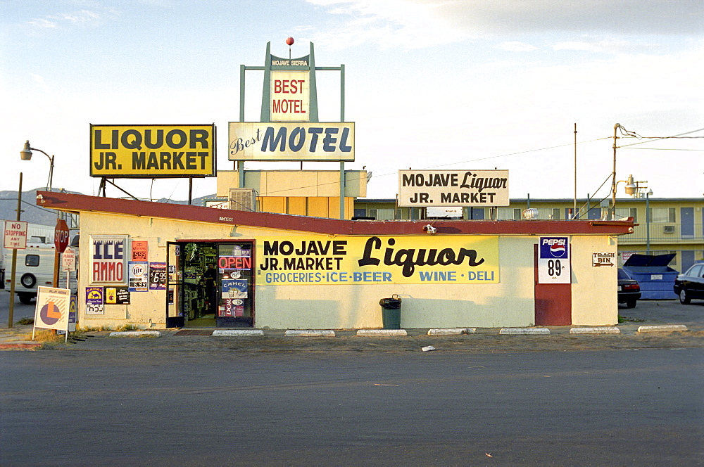 Store with lots of signs, Mojave Desert, California, USA