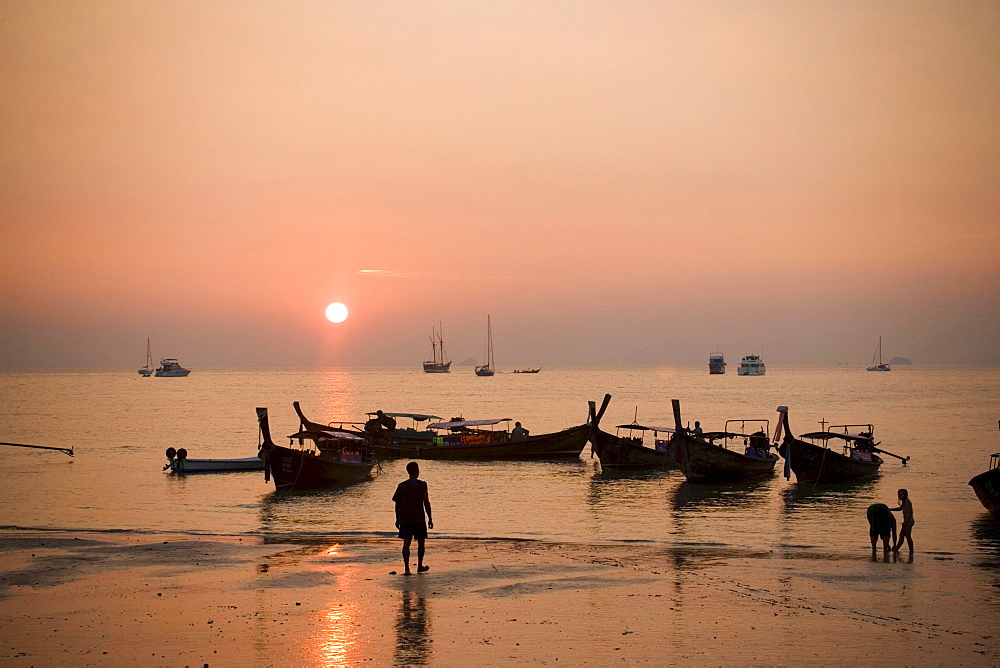 Boats anchoring at Hat Rai Leh, Railey West in sunset, Laem Phra Nang, Railay, Krabi, Thailand, after the tsunami