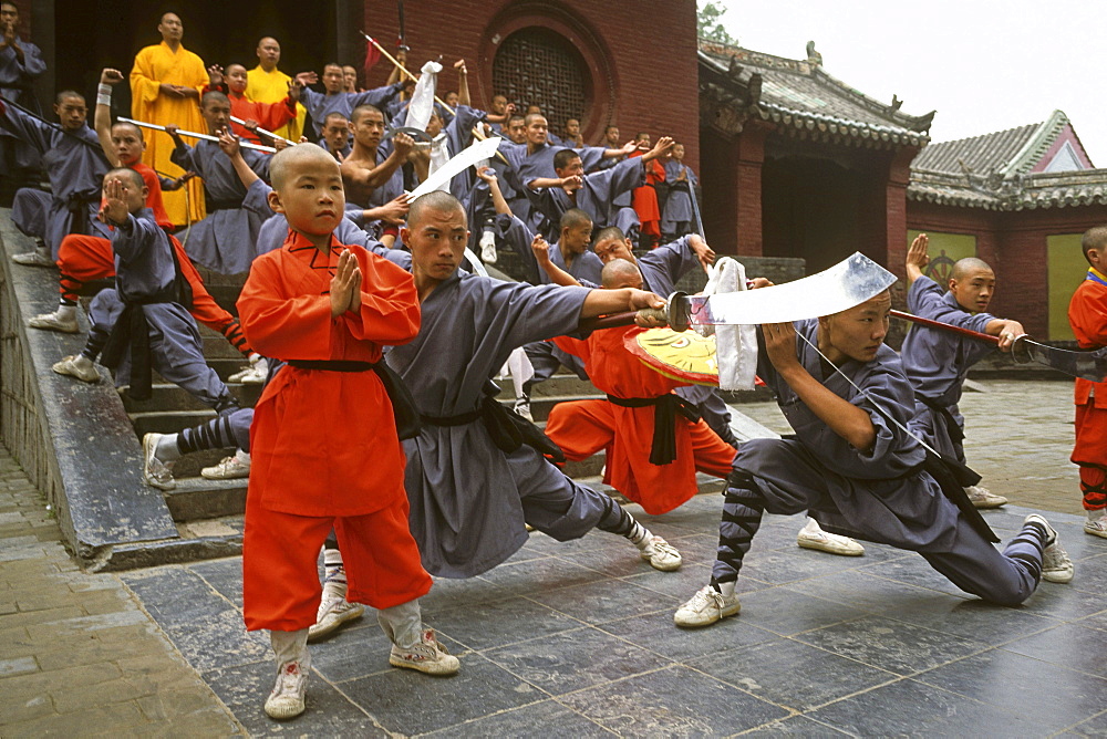 Shaolin Buddhist monks, Kung Fu students rehearsing for a performance on Buddhas birthday, Shaolin Monastery, known for Shaolin boxing, Taoist Buddhist mountain, Song Shan, Henan province, China