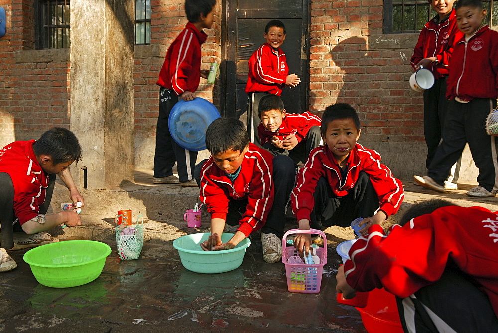 outdoor bathroom in a courtyard of a new Kung Fu school, washing hair, face, cleaning teeth, near Shaolin, Song Shan, Henan province, China, Asia