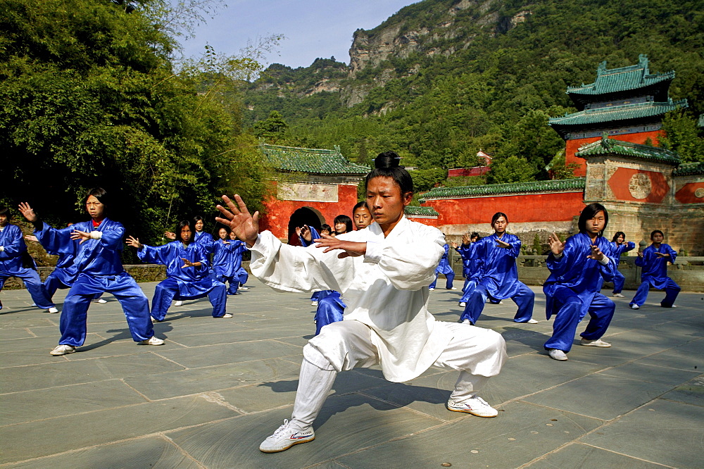 Taichi training from Wudang School of Martial Arts, in front of Purple Heaven Hall, Zi Xiao Gong, peak 1613 metres high, Wudang Shan, Taoist mountain, Hubei province, Wudangshan, Mount Wudang, UNESCO world cultural heritage site, birthplace of Tai chi, China, Asia