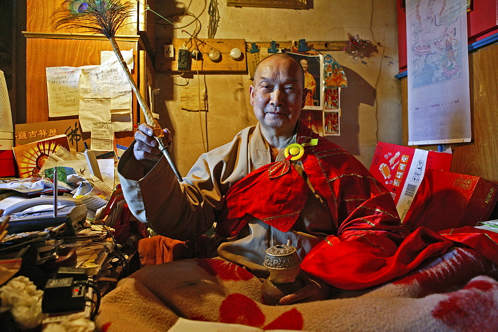 Abbot with peacock feather, Shi Neng Xiu of Santa Monastery, Wutai Shan, Buddhist holy Mountain, Shanxi province, China, Asia