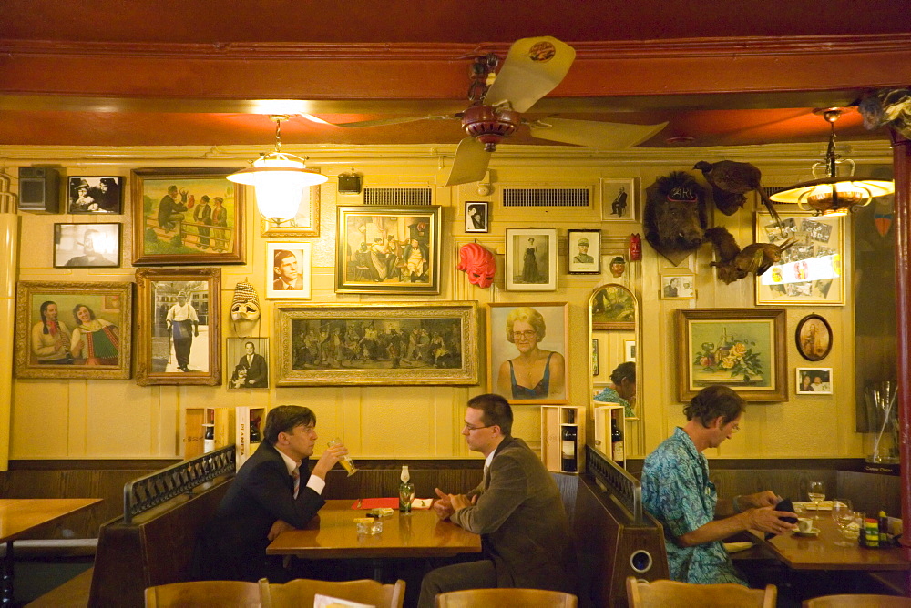 Guests sitting in the restaurant Zum Weissen Kreuz, Zurich, Canton Zurich, Switzerland