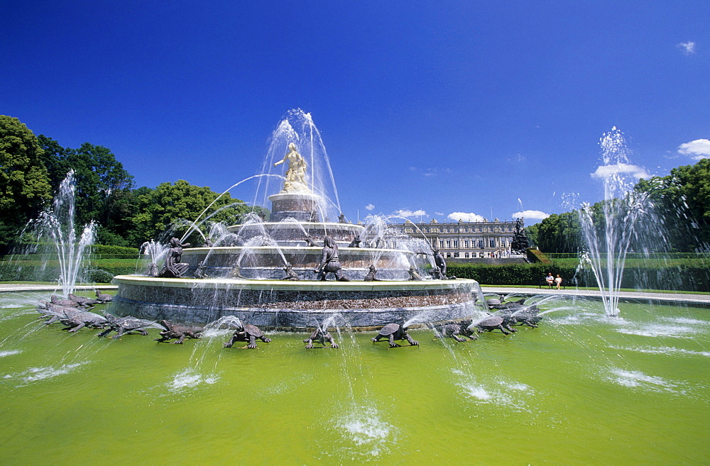 Fountain in front of castle of Herrenchiemsee, island of Herrenchiemsee, Lake Chiemsee, Chiemgau, Upper Bavaria, Bavaria, Germany