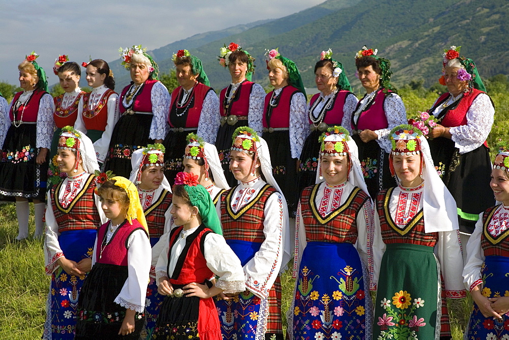 Women and girls in traditional costumes at Rose Festival, Karlovo, Bulgaria, Europe