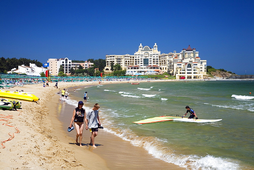 People on the beach in front of Marina Royal Palace Hotel, Djuni, Black Sea, Bulgaria, Europe