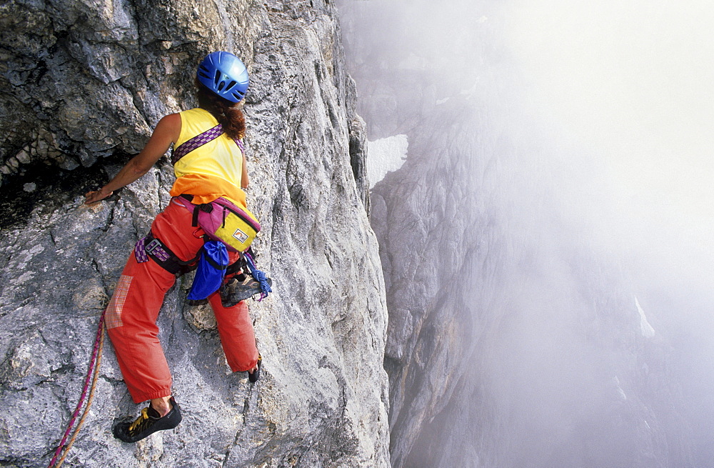 climber on south face of Dachstein, Steiner ledge, Steiner route, Dachstein range, Styria, Austria