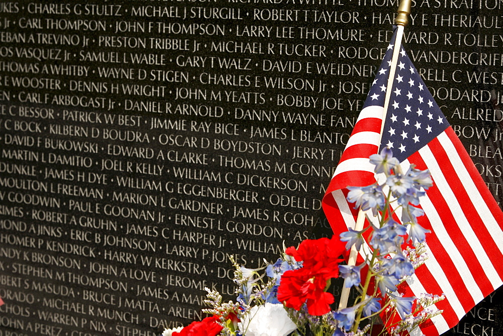 Vietnam Veterans Memorial with wreath and flag, Washington DC, United States, USA