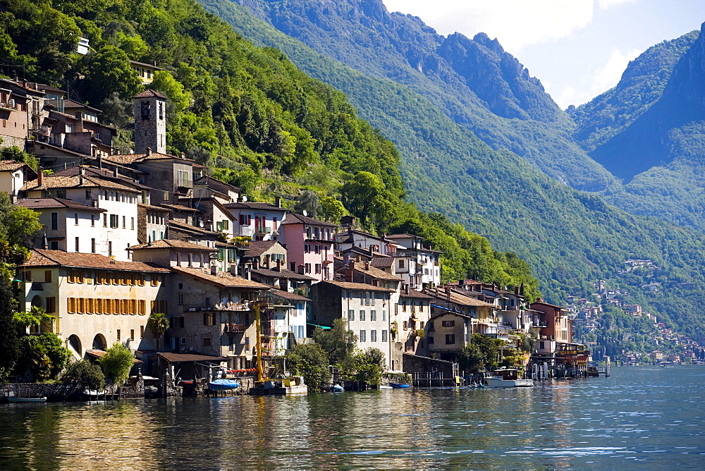 View over Lake Lugano to picturesque village Gandria at mountainside of mount Monte Bre, Lugano, Ticino, Switzerland