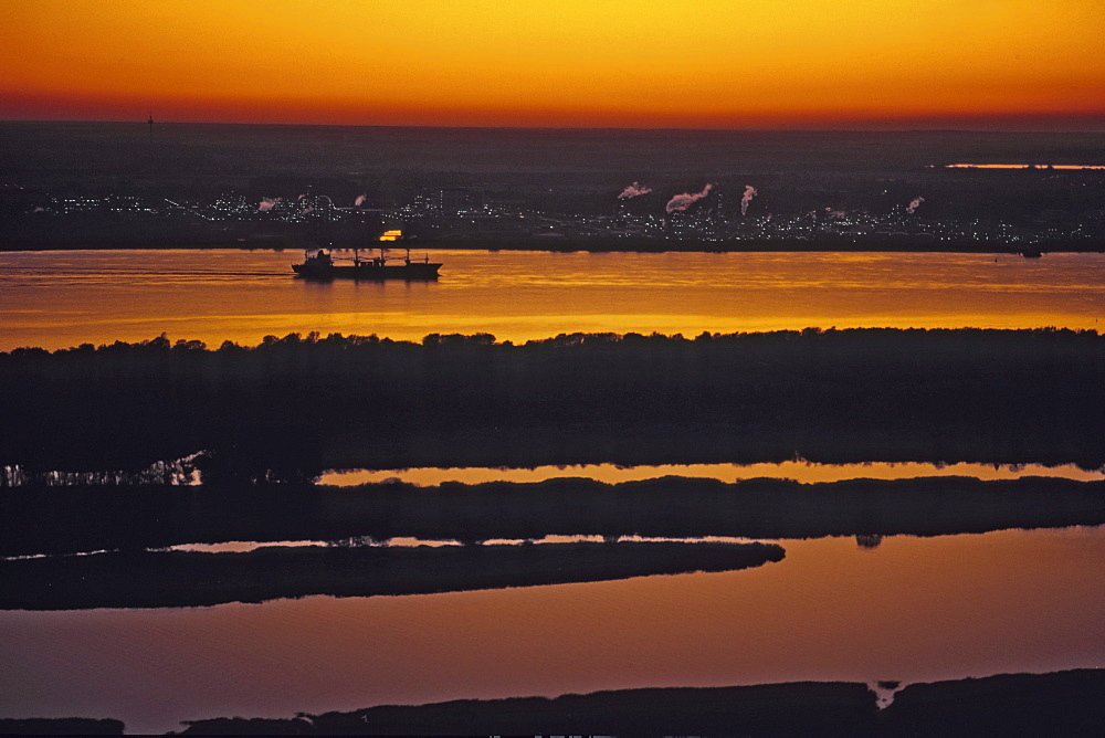 aerial photo of river Elbe at sunset, northern Germany, chemical plant