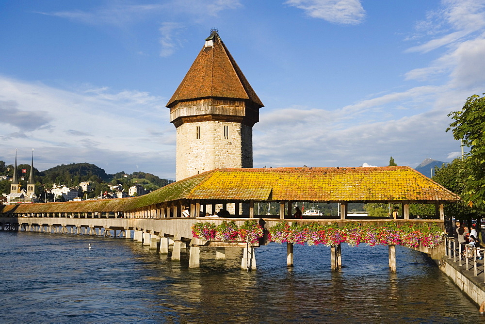 Reuss river with Kapellbruecke (chapel bridge, oldest covered bridge of Europe) and Wasserturm, Lucerne, Canton Lucerne, Switzerland