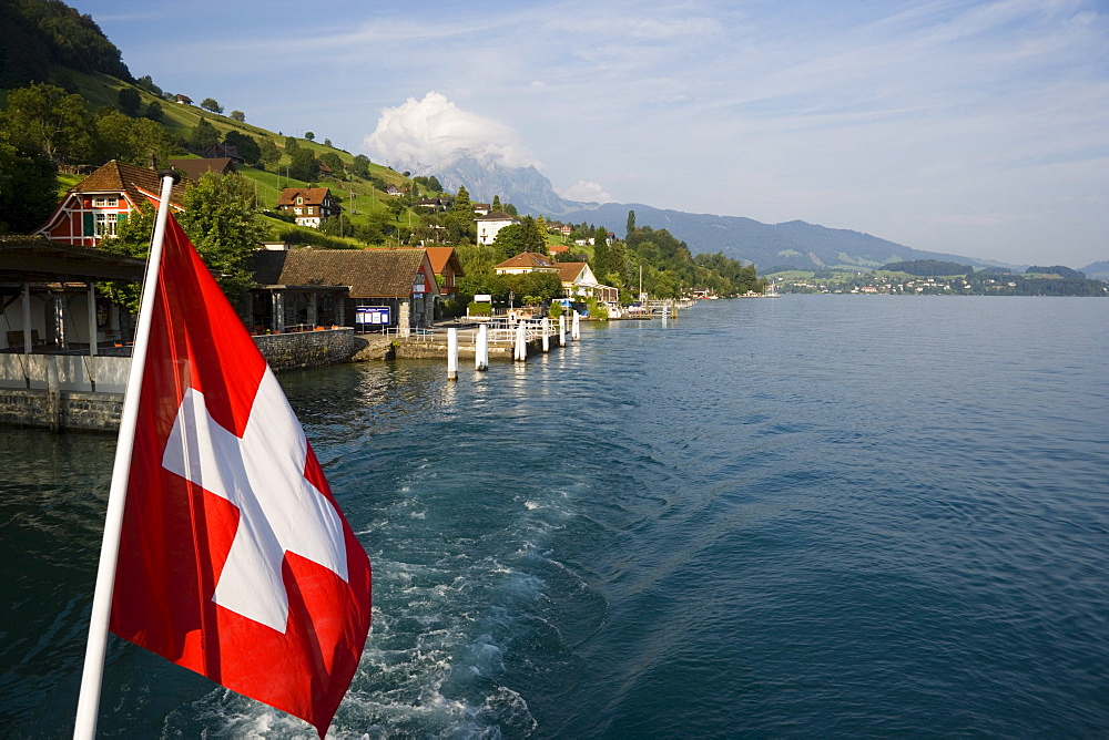 Swiss flag, Kehrsiten Buergenstock, Pilatus (2132 m) in background, Kehrsiten Buergenstock, Canton of Lucerne, Switzerland