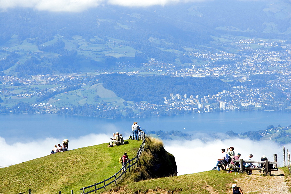 People on Rigi Kulm (1797 m) enjoying view over Lake Lucerne to Pilatus (2132 m), Rigi Kulm, Canton of Schwyz, Switzerland