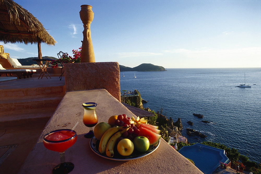 Cocktails and fresh fruit at a small luxury hotel, La Casa que canta Zihuatanejo, Mexico, America