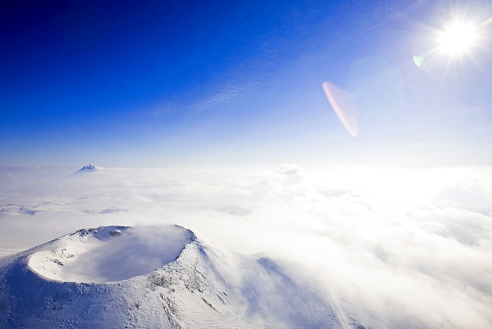 A crater of a volcano and clouds on top of the volcano Gorely, Kamtchatka, Sibiria, Russia