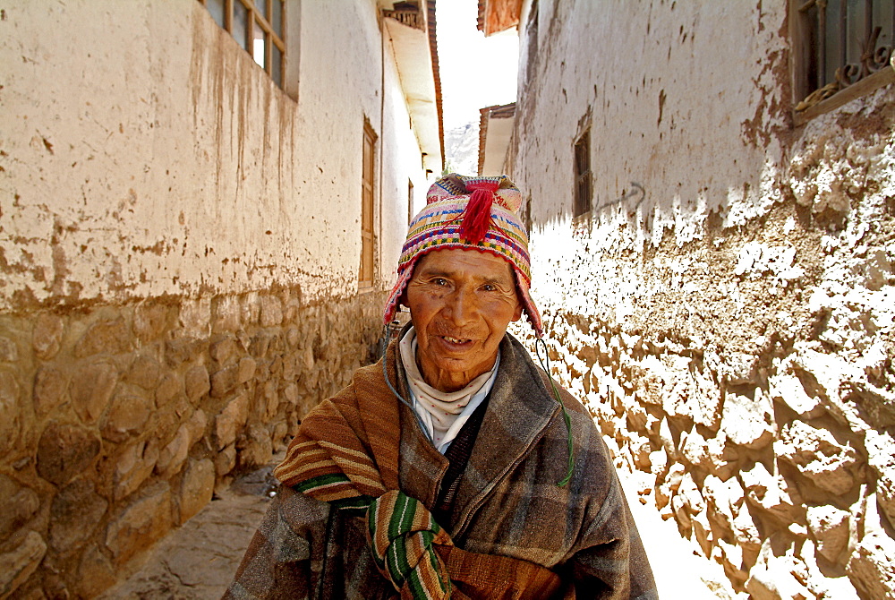 Inca peasant in an alley in Pisac, Peru, South America