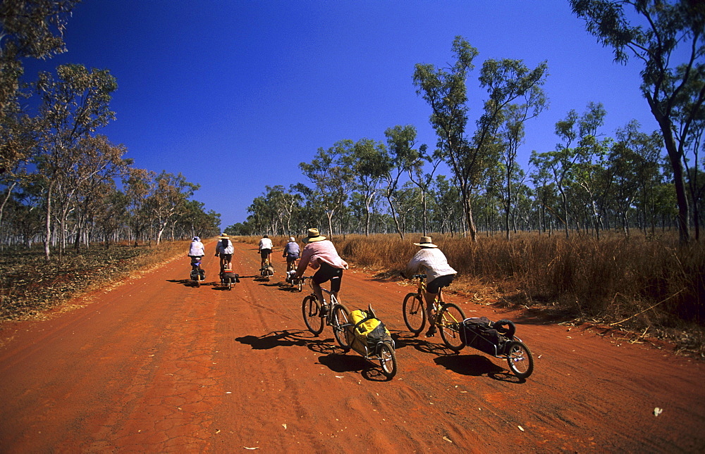 Cyclists on the road to Drysdale River Station, Gibb River Road, Western Australia, Australia