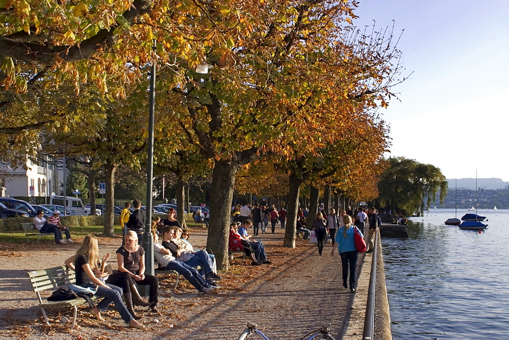 Switzerland Zuerich, Zurich, lake promenade in autumn, people