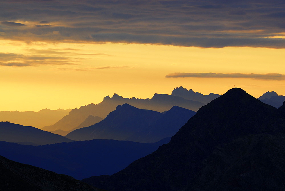 backdrop scenery of Dolomites at sunrise from hut Flaggerschartenhuette, Marburg-Siegener Huette, Rifugio Forcella di Vallaga, Sarntal range, South Tyrol, Alta Badia, Italy