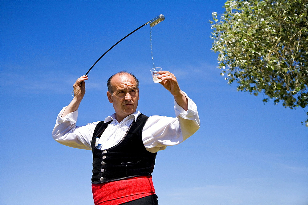 Man with glass of Sherry, Seville, Andalusia, Spain