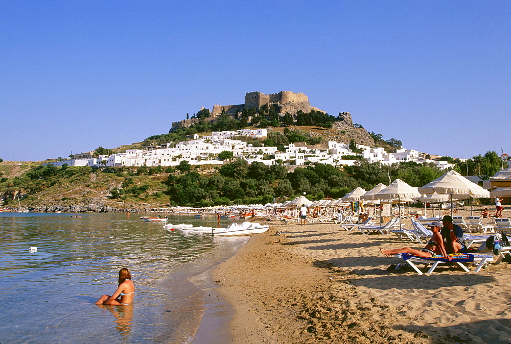 Beach life on Lindos beach, Rhodes Island, Dodecanese, Greece