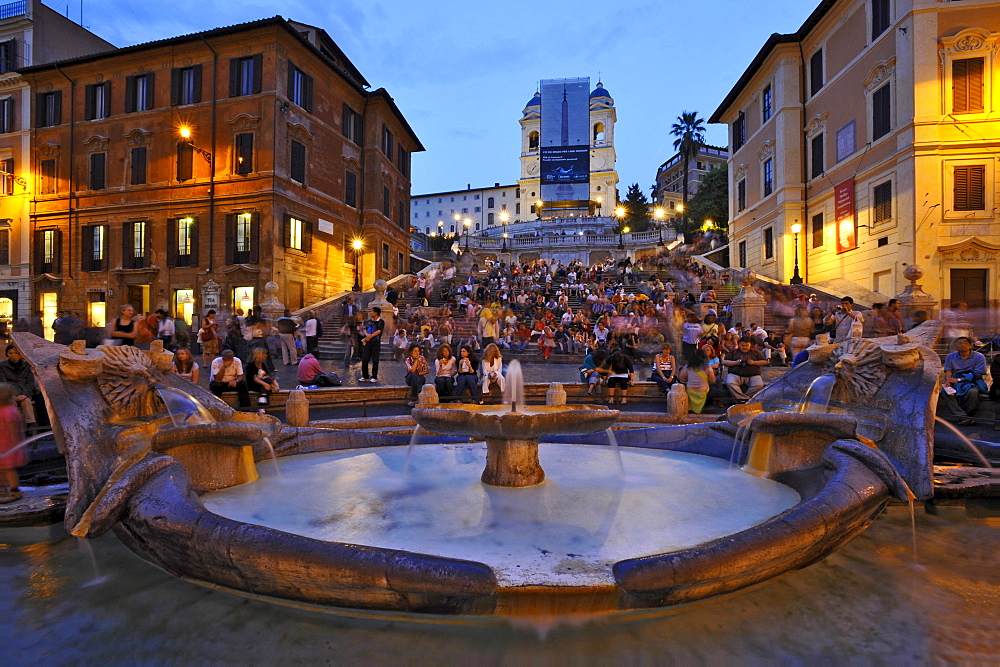 Spanish steps and Bernini fountain, Fontana della Barcaccia, in the evening light, Rome, Italy