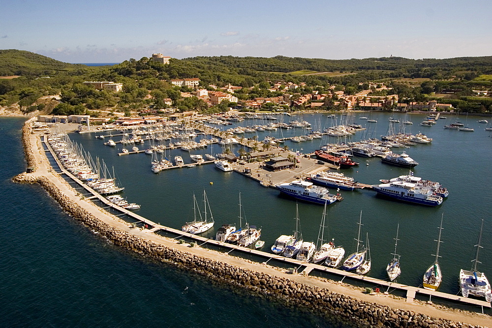 Aerial view of Porquerolles with city and boats at the quai, Iles d'Hyeres, France, Europe