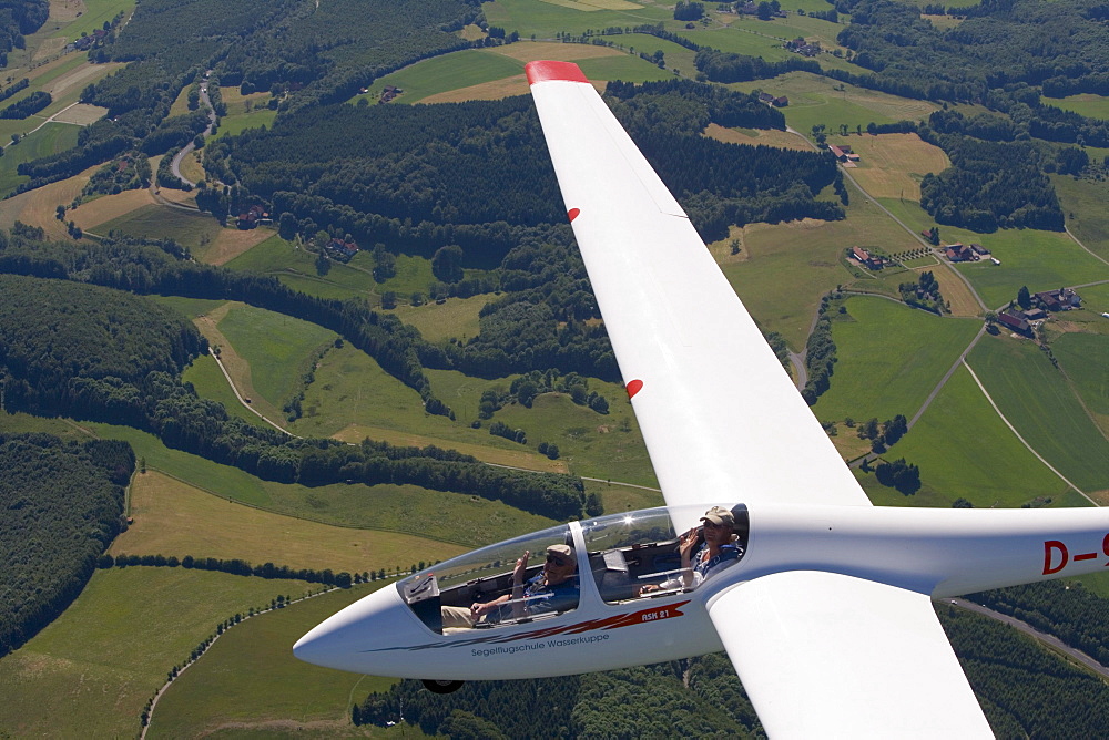 Aerial photo of a glider airplane, near Wasserkuppe Mountain, Rhoen, Hesse, Germany