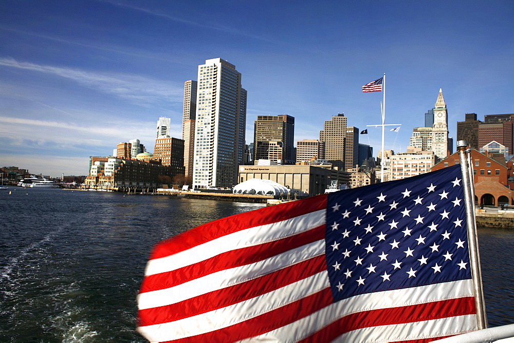 View of Boston Harbor with flag, Boston, Massachusetts, USA