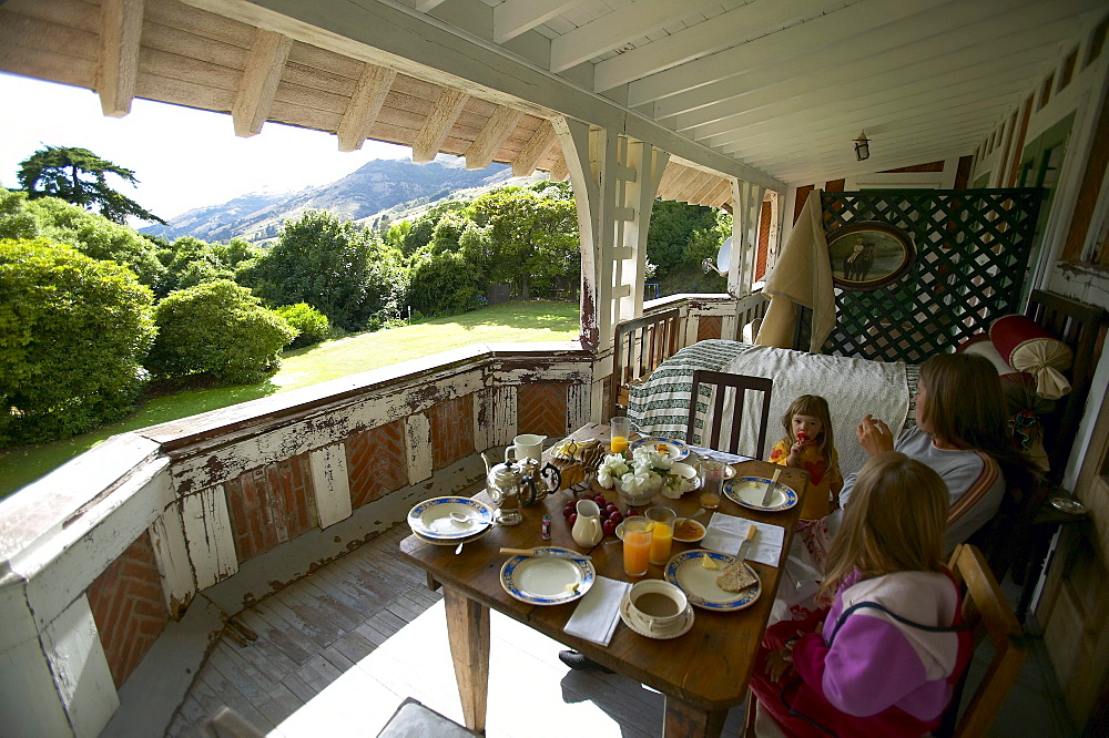 Fruehstueck on terace, Rowendale Homestead farm, B & B, Okains Bay Bank`s Peninsula, east coast, South Island, New Zealand