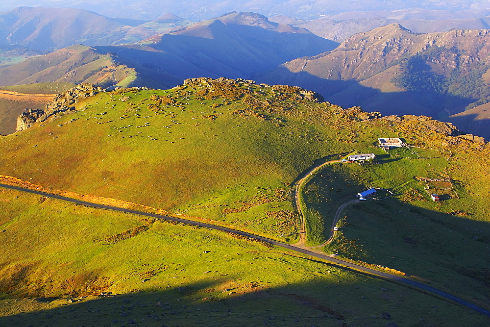 Mountains and sheep farm in the evening light, Bosque del Irati, Pyrenees, Navarra, Spain