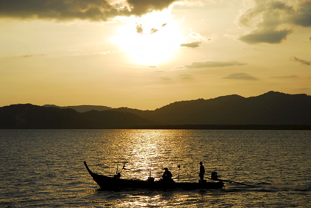 Boat in the evening light, bay of Phang Nga, Thailand