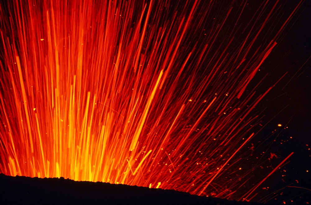 Close up of lava fountain of Yasur volcano at night, Tanna, Vanuatu, South Pacific, Oceania