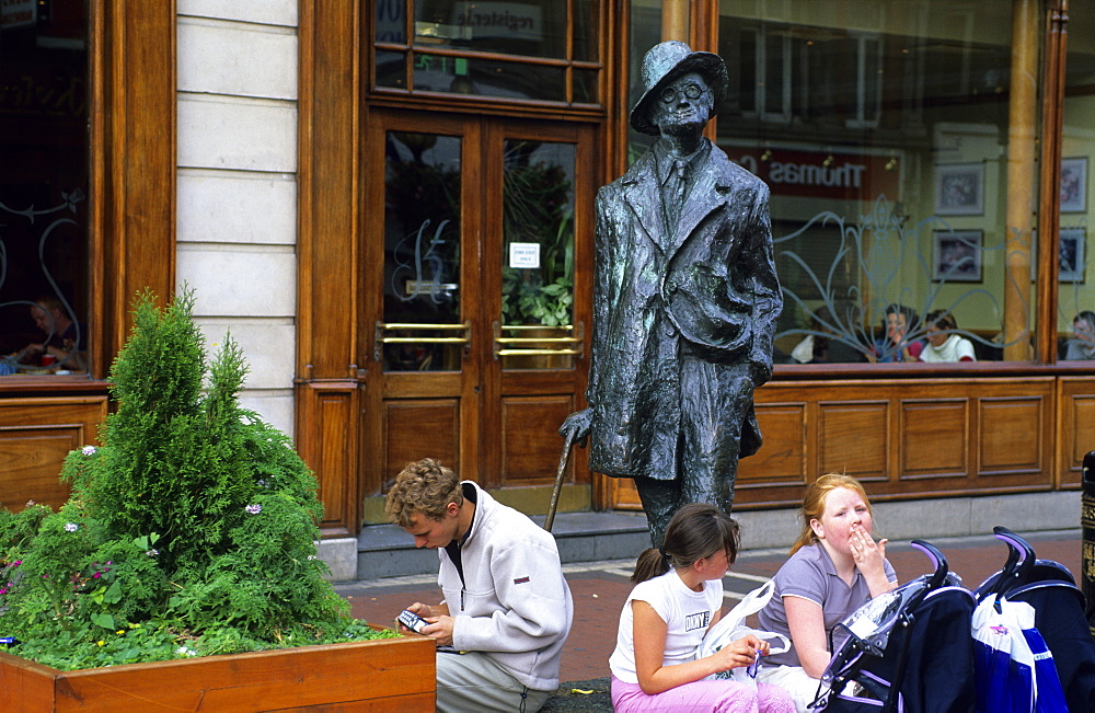 People in front of the James Joyce Statue at Earl Street, Dublin, Ireland, Europe