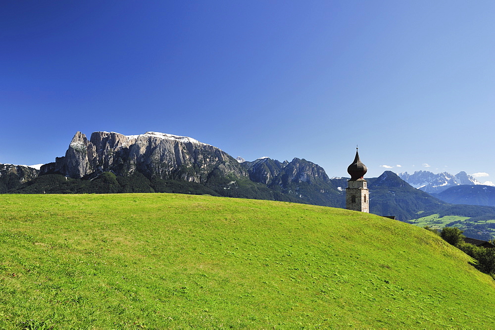 Church spire with Schlern, Klobenstein, Sarntal Alps, Dolomites, UNESCO World Heritage Site, South Tyrol, Italy