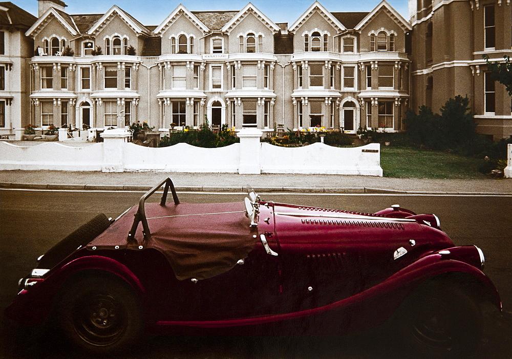 Vintage car in front of terrace houses, Torquay, Devon, Southern England, Great Britain, Europe